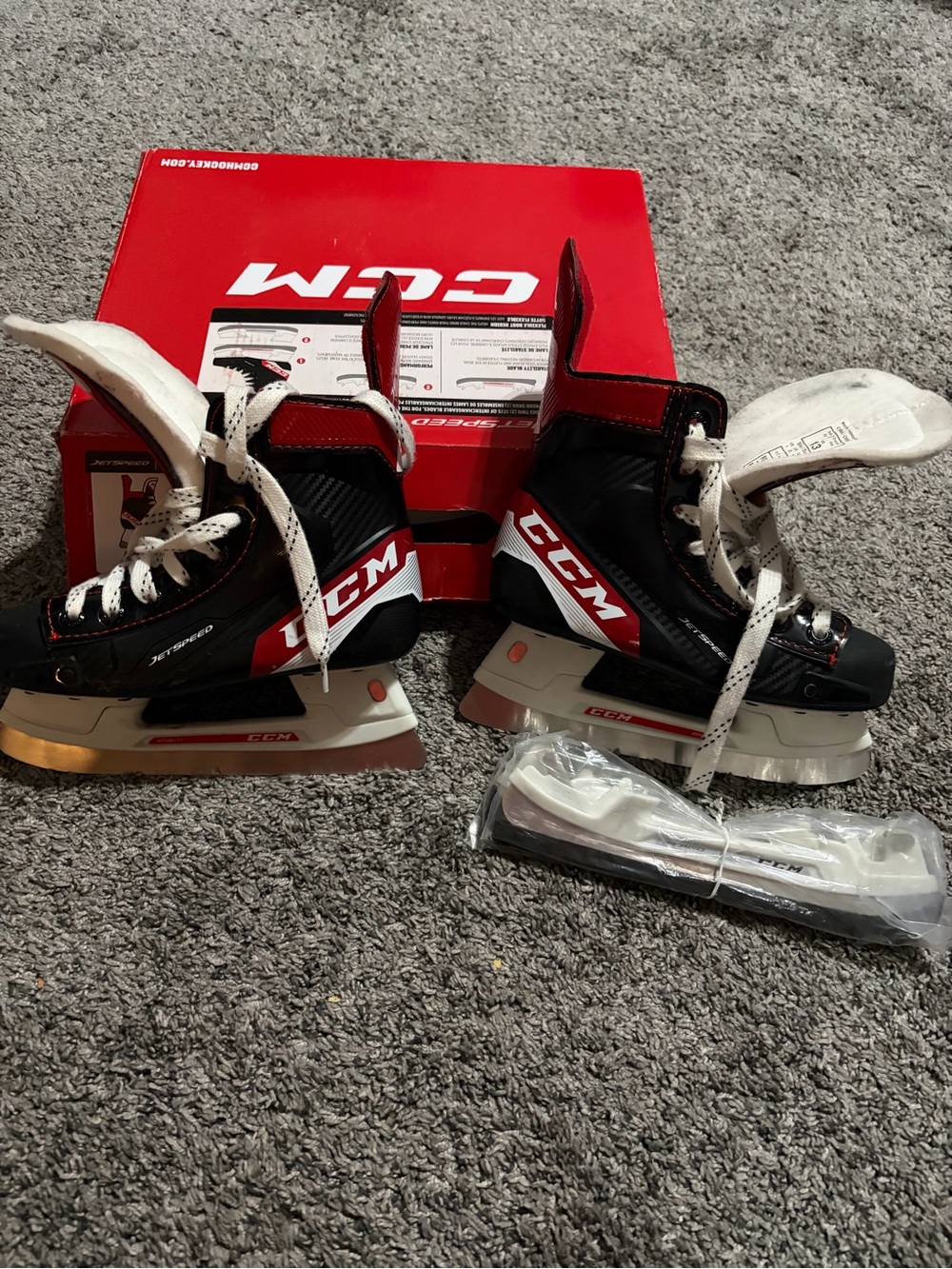 CCM Kids Ice Hockey Skates – Black, Red & White